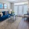 a living room with a blue couch