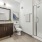 a bathroom with a large mirror